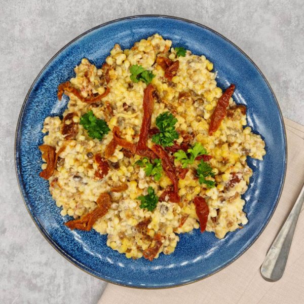 Fregola sarda mit Tomaten und Pilzen